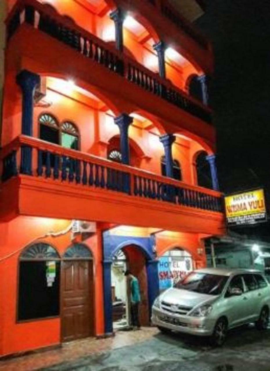 מלון מדאן Wisma Yuli Syariah מראה חיצוני תמונה